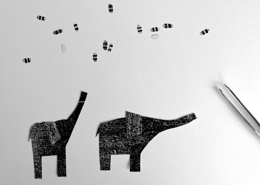 Elephants blowing away bees